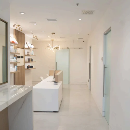 Modern white room with a counter and shelves in Lehi, UT